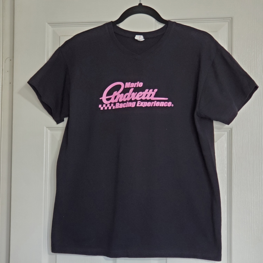 Mario Andretti v neck pink font on a black short sleeve graphic tee shirt Lg.